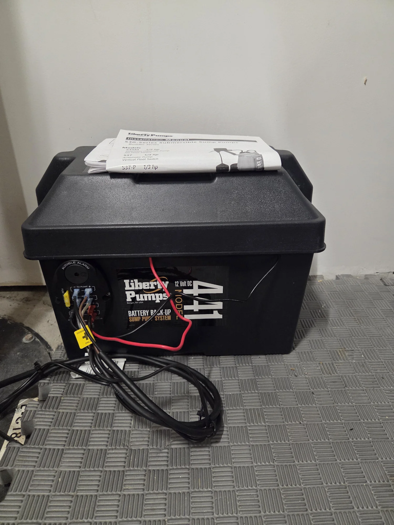 Battery backup equipment for a basement sump pump
