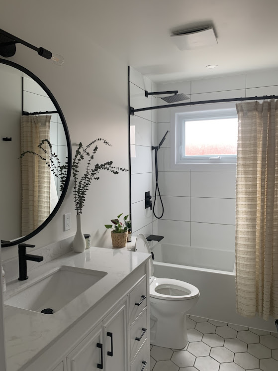 Bathroom renovation with black fixtures