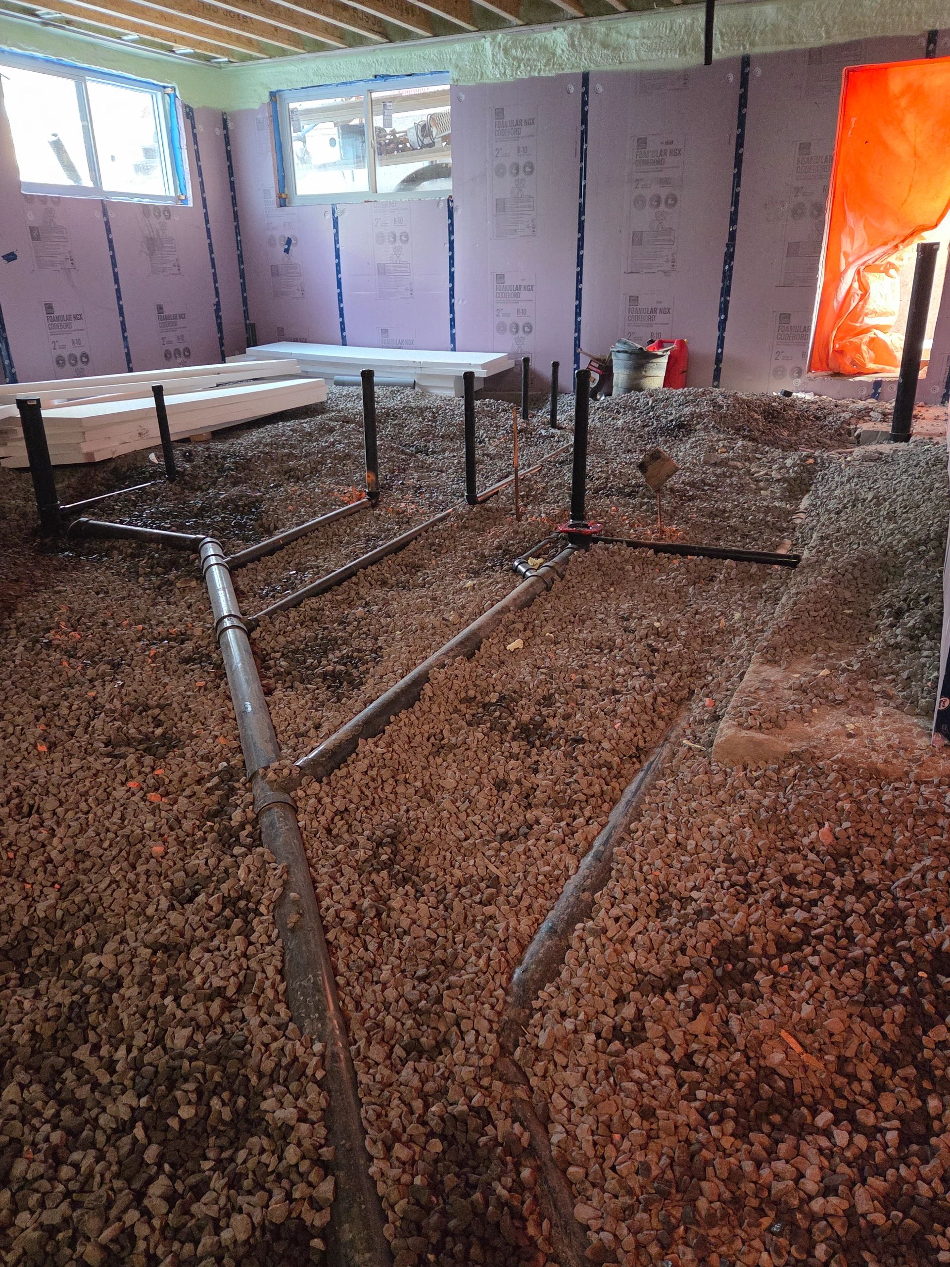 Completed basement plumbing rough-in by Hydra Plumbing